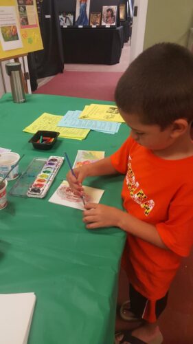young-boy-at-crafts-activity-table