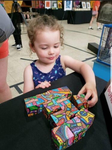 2018-little-girl-with-activity-blocks